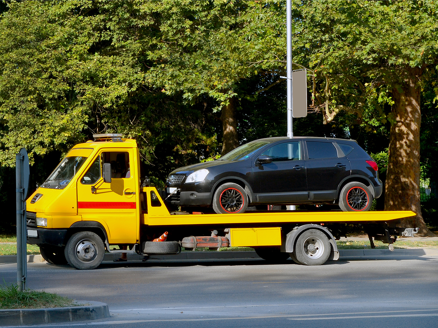 towing truck carrying a car